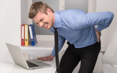 Back_pain_Getting_Up_from_Chair_shutterstock_209301169